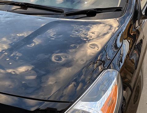 681919e68acb9601f0f18b57_car with hail damage car with hail damage